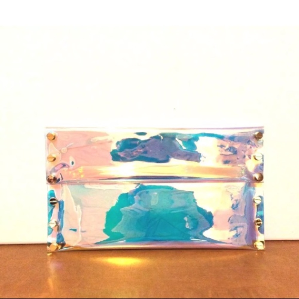 New Cosmica Holographic Clutch